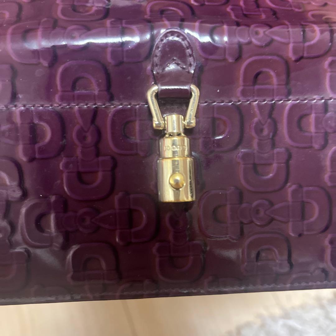 Gucciダークパープル エンボスロゴ 長財布 12