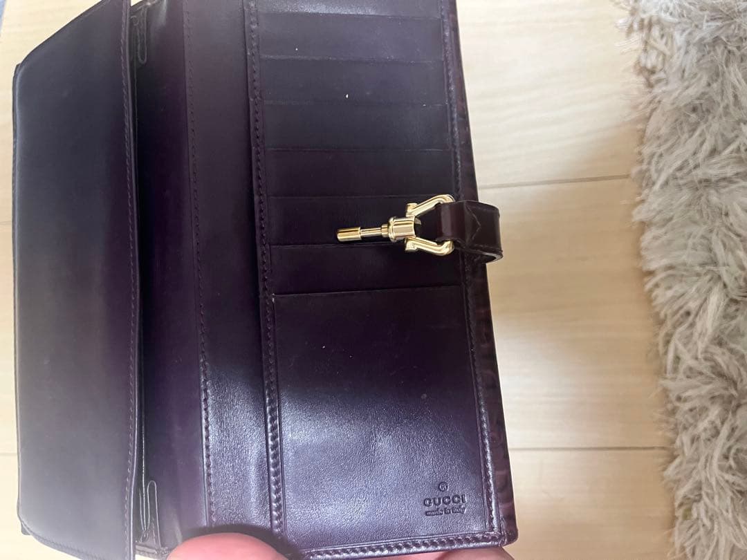 Gucciダークパープル エンボスロゴ 長財布 6