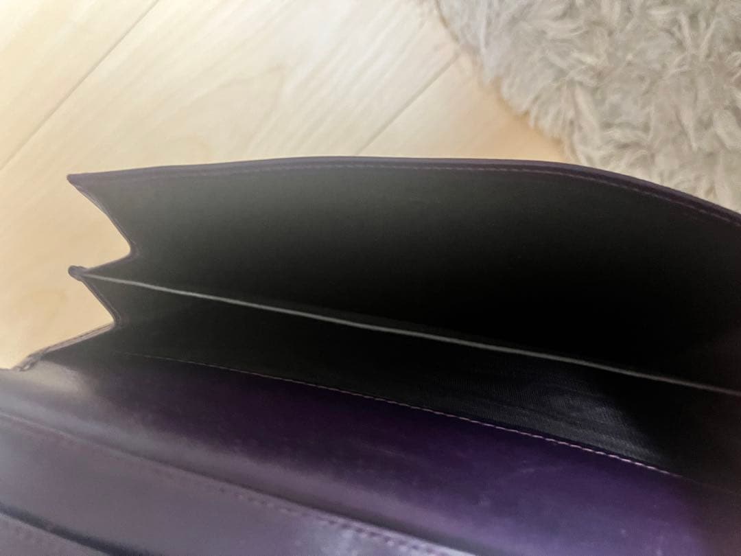 Gucciダークパープル エンボスロゴ 長財布 9